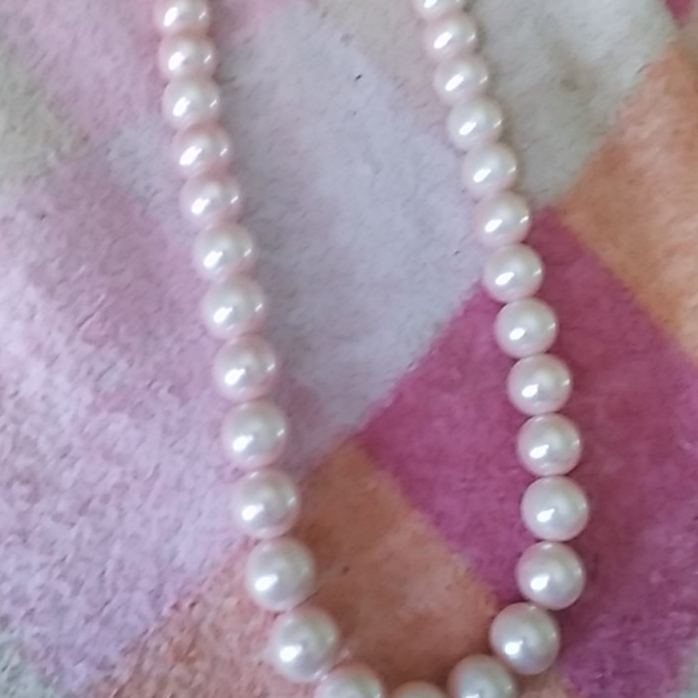 Pink pearl necklace with pink ribbon tie